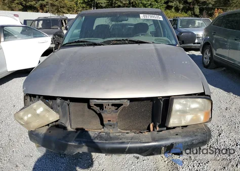 1999 GMC Sonoma z USA, uszkodzony, nr VIN 1GTCS19X0X8530509